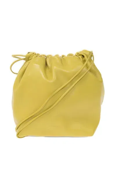 Jil Sander Dumpling Drawstring Shoulder Bag In Yellow