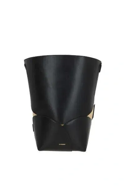 Jil Sander Logo Embossed Drawstring Bucket Bag In Black