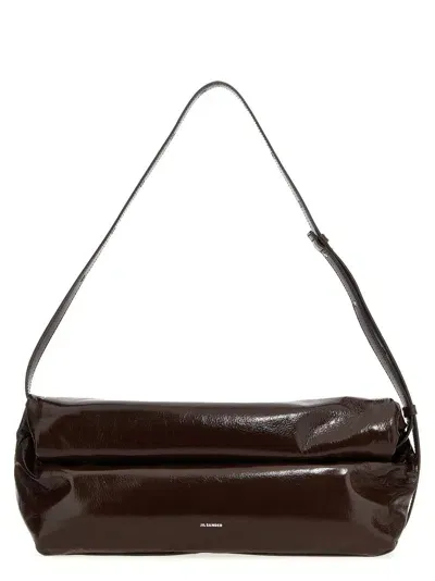 Jil Sander Rollup Medium Crossbody Bag In Bordeaux