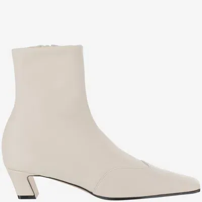 Khaite 40mm Nevada Stretch Ankle Boots In Cream