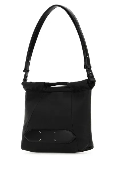 Maison Margiela Handbags. In Black