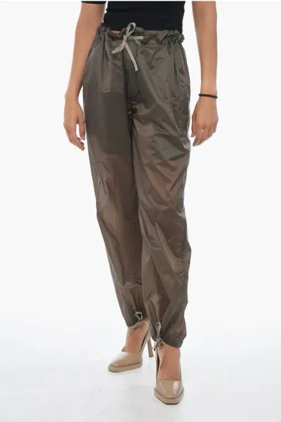 Maison Margiela Mm1 Nylon Pants With Drawstringed Ankles In Brown