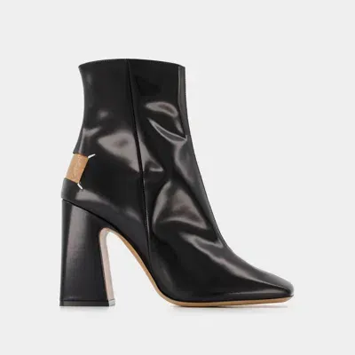 Maison Margiela Boots In Black