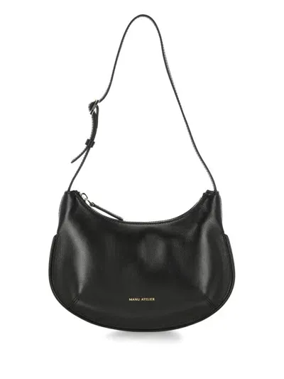 Manu Atelier Logo Printed Shoulder Bag In Black