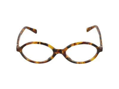 Miu Miu Eyeglasses In Havana Clear