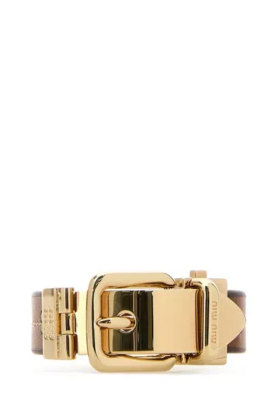 Miu Miu Logo Engraved Buckle Bracelet In Brown