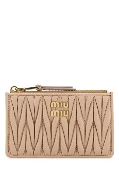 Miu Miu Matelassé Zipped Wallet In Beige