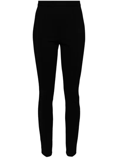 Moncler Fitted Stretch Pants With Zipper In Black