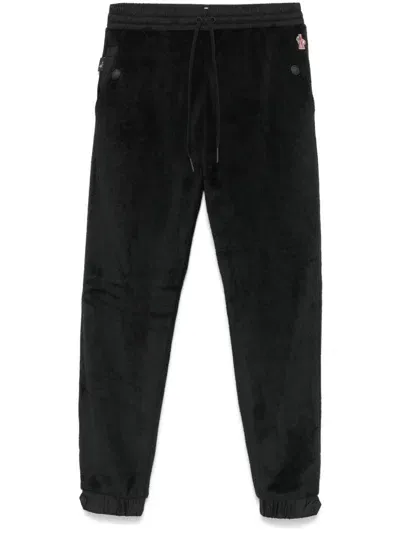 Moncler Fleece-texture Trousers In Schwarz