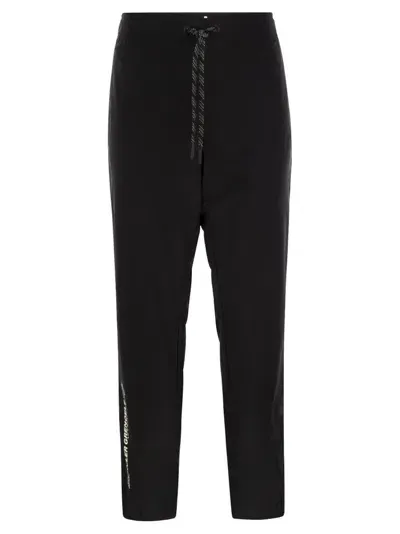 Moncler Grenoble Logo Printed Drawstring Trousers In Black