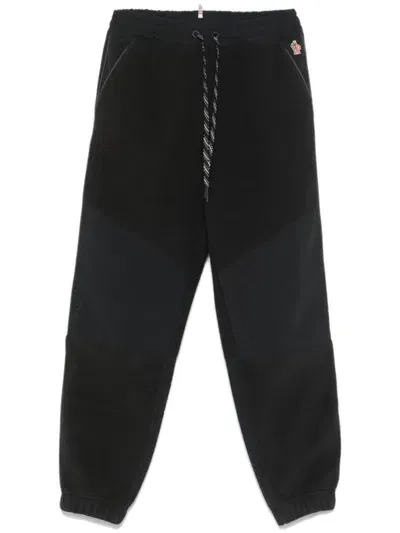 Moncler Logo-embroidered Ski Trousers In Black