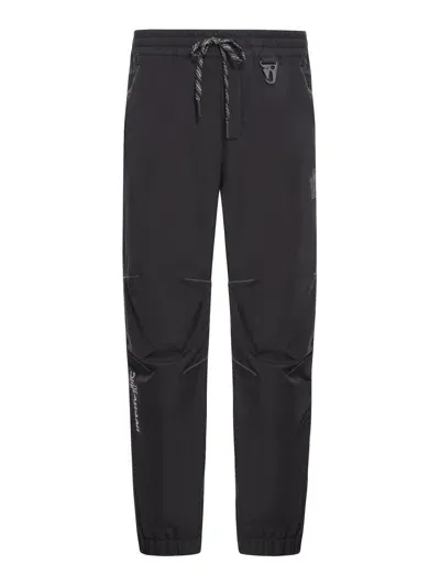 Moncler Grenoble Logo Embossed Drawstring Track Pants In Black