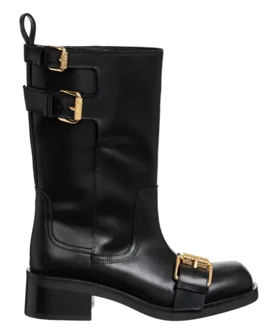 Moschino Heeled Boots In Black