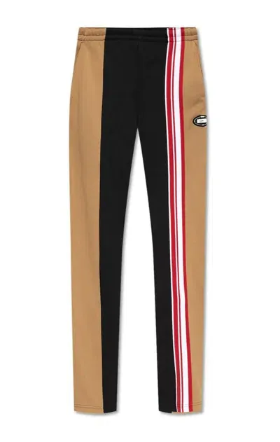 Moschino Logo Patch Striped Pants In Multi