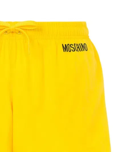 Moschino Logo-print Swim Shorts In Yellow