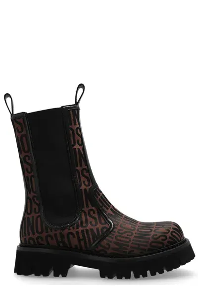 Moschino Monogrammed Ankle Boots In Brown