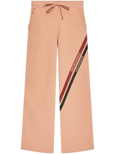 Moschino Logo Printed Pants In Pink