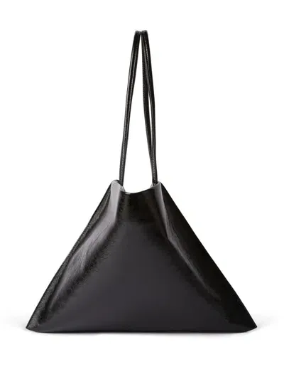 Msgm Logo-debossed Leather Tote Bag In Black