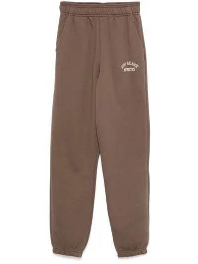 New Balance Graphic Track Pants In Brown