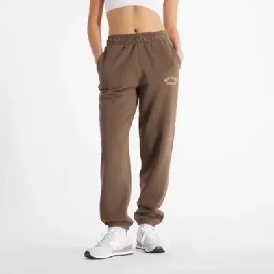 New Balance Graphic Track Pants In Brown