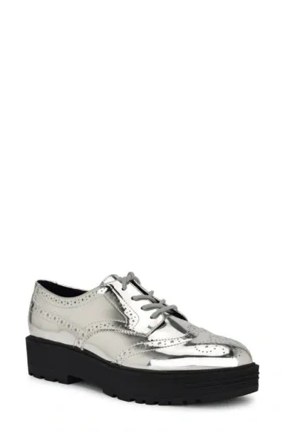 Nine West Resttin Wingtip Platform Derby In Silver Mirror Metallic