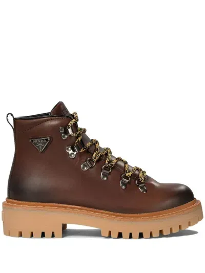 Prada Enamel Triangle-logo Boots In Brown