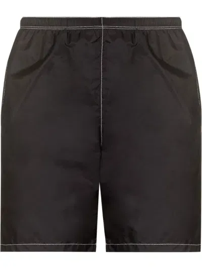 Prada Logo-plaque Swim Shorts In Schwarz