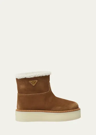 Prada Suede Shearling Cozy Platform Booties In Cannella