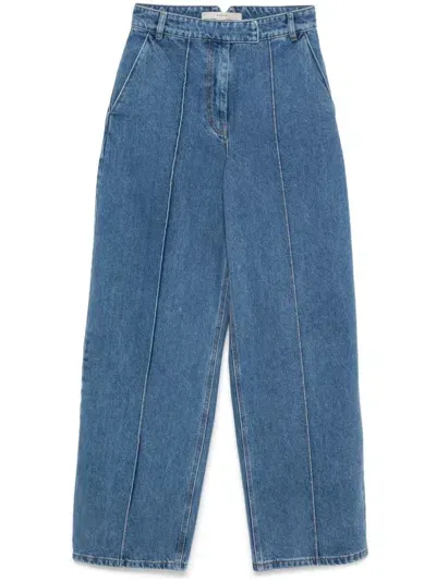 Remain Tapered Jeans In Blue