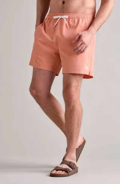 Rhone 5.5-inch Water Repellent Swim Trunks In Coral Clay