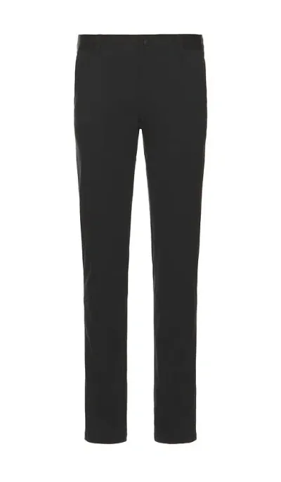 Rhone Commuter Slim Pant In Black