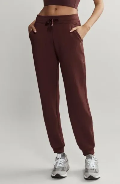 Rhone Dreamglow Joggers In Brown Berry