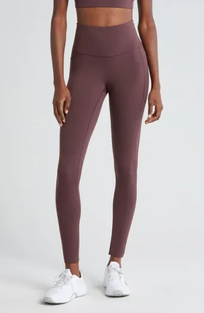 Rhone Revive Pockets 7/8 Leggings In Brown Berry