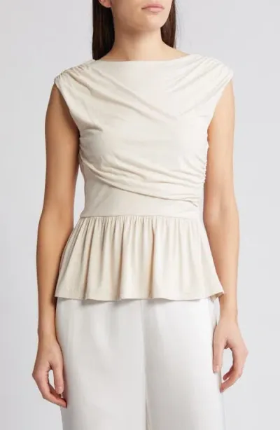 Rue Sophie Leona Asymmetric Back Peplum Top In Champagne