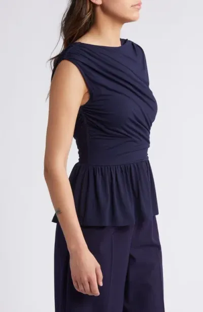 Rue Sophie Leona Asymmetric Back Peplum Top In Midnight