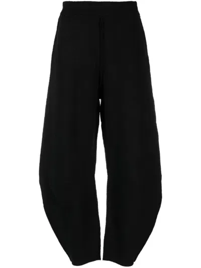 Rus Yoki Tapered-leg Merino Trousers In Black