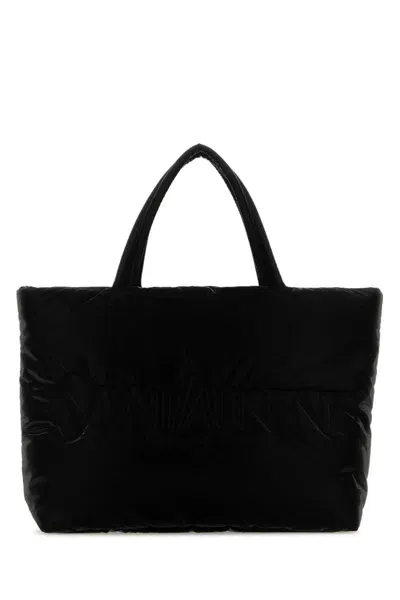 Saint Laurent Handbags. In Black