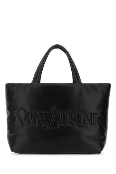 Saint Laurent Handbags. In Black