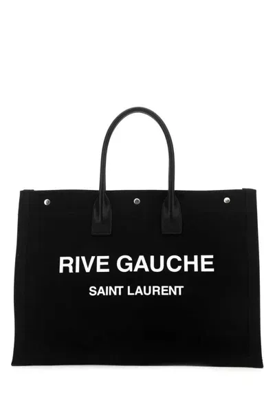 Saint Laurent Handbags. In Black