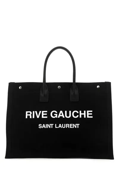 Saint Laurent Handbags. In Black