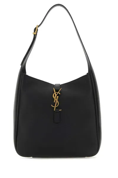 Saint Laurent Handbags. In Black