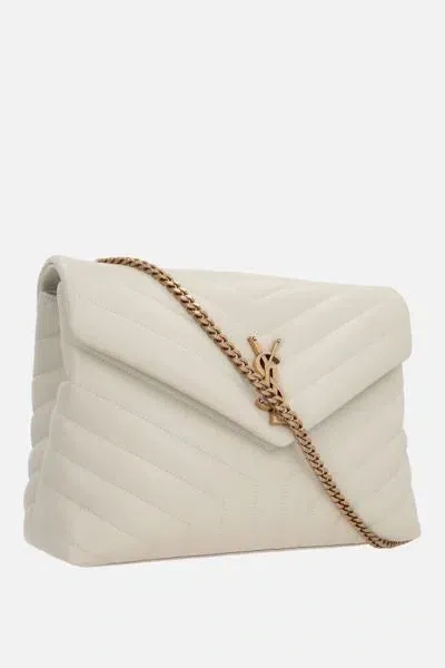 Saint Laurent Handbags. In White