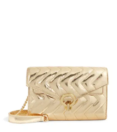 Sandro Quilted Leather Yza Clutch Bag In Beige