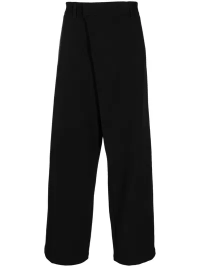 Songzio Asymmetric Wide-leg Trousers In Black