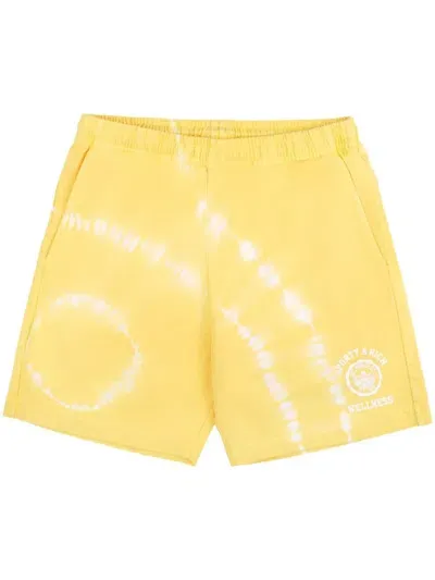 Sporty And Rich Emblem Cotton Track Shorts In Yellow