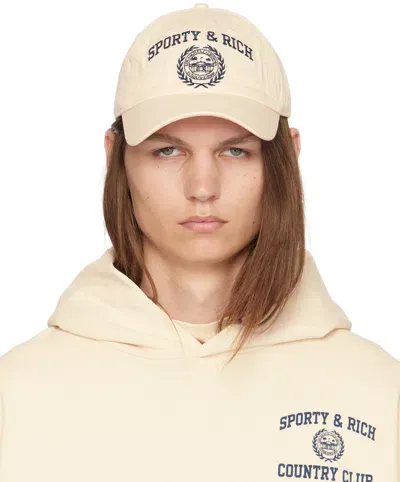 Sporty And Rich Off-white Varsity Crest Cap In Cream