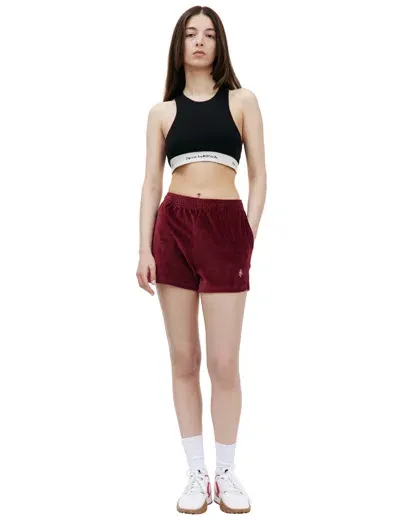 Sporty And Rich Src Velour Mini Shorts In Merlot