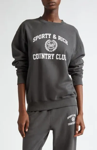 Sporty And Rich Sporty & Rich Varsity Crest Cotton Graphic Sweatshirt In Faded Black