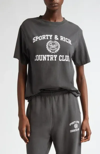 Sporty And Rich Sporty & Rich Varsity Crest Cotton Graphic T-shirt In Faded Black