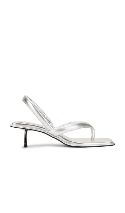 St Agni Sling Back Thong Heel In Metallic Silver